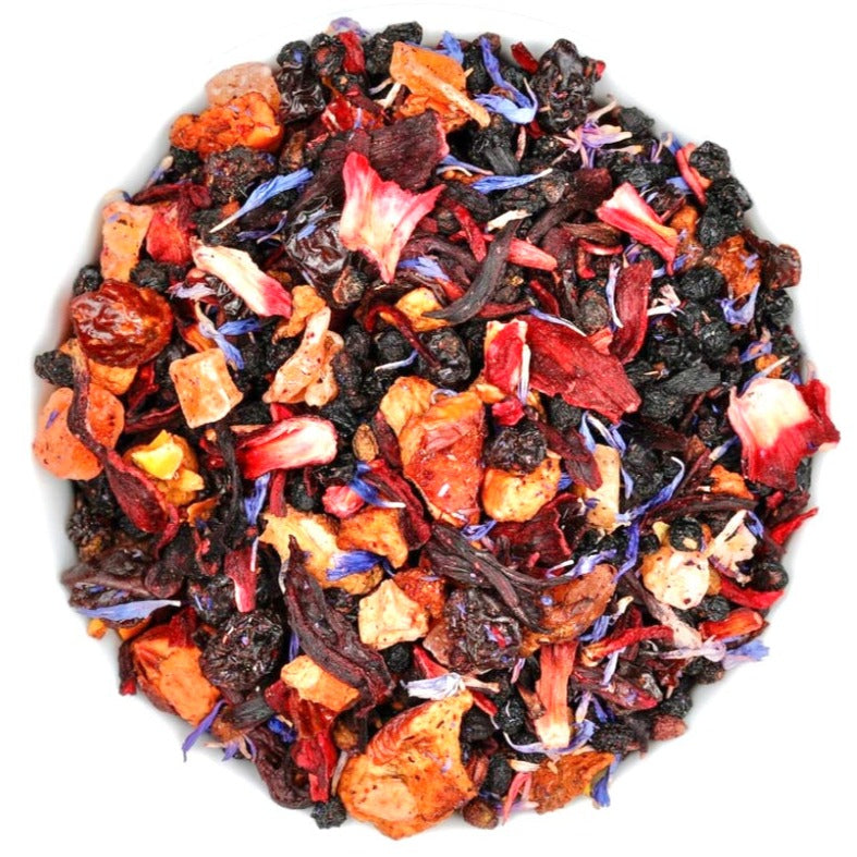 A top-down view of a round red pile of Fruitea Loose leaf tisane from MyPositiviTEAs