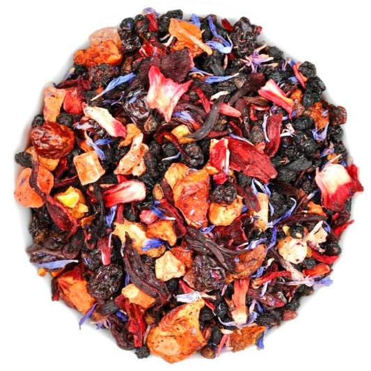 A top-down view of a round red pile of Fruitea Loose leaf tisane from MyPositiviTEAs